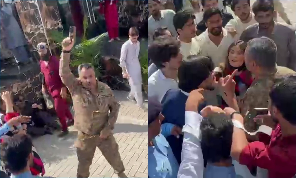 کرنل اسفند یار کو طلبہ نے گھیر رکھا ہے، دوسری طرف ان کی فائرنگ کرتے ہوئے تصویر